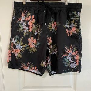 Volcom Earthly Delight board-shorts black with tropical flowers size Medium